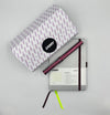 Lamy pen and notebook set on a white background